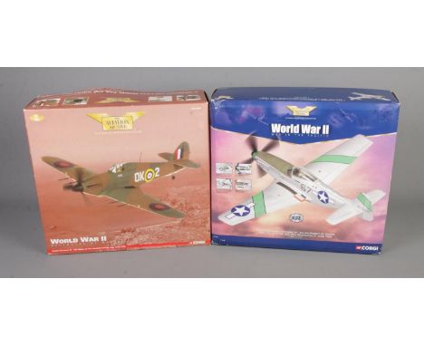 Two boxed Corgi Aviation Archive 1:32 scale models: WWII War In The Pacific P-51D Mustang - 'Stinger VII' and WWII Defenders 