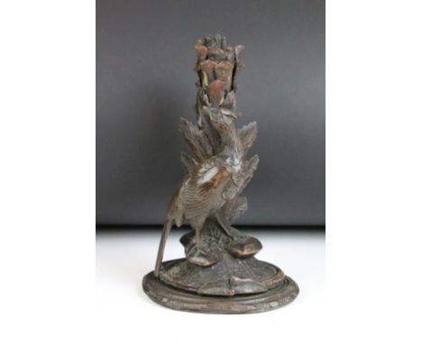 19th century carved wooden candlestick in the form of a pheasant and tree trunk, meausres approx 