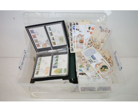 Large collection of first day covers to include mostly loose examples but also covers across five albums. Collection covers a