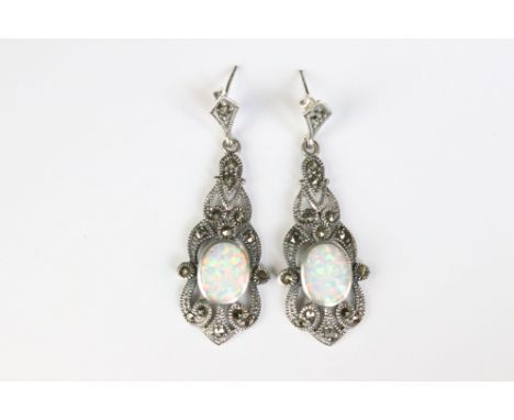 A pair of silver marcasite and art deco style opal paneled drop earrings 