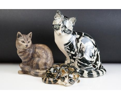 Three ceramic cats to include two Studio six Fulham pottery cats (both signed to the bases) together with a Poole pottery cat