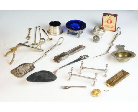 A small group of mixed collectables to include silver plated knife rests, salts and spoons, folding rule, tea strainer and a 