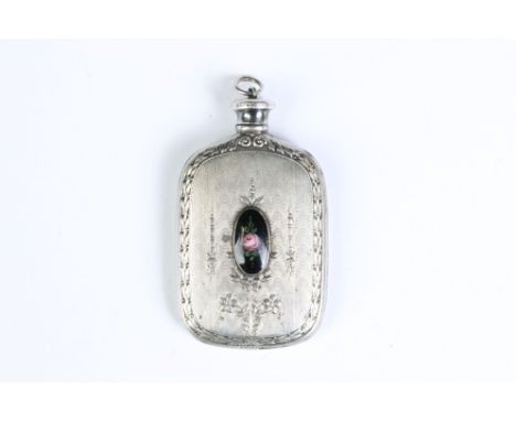 A vintage sterling silver scent bottle with floral decoration and central floral ceramic cabochon. 