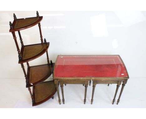 Nest of Three Table with red leather inset tops and glass covers, largest table 76cm long x 48cm high together with a Corner 