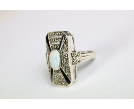 A substantial silver marcasite art deco style ring with opal panel 