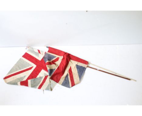 Two vintage cloth Union flags, with poles (measure approx 78cm x 55cm and 78cm x 59cm - excluding poles) 