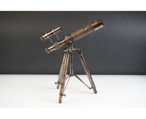 A brass telescope on tripod stand, approx 31.5cm high 