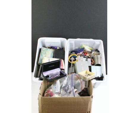 A very large collection of vintage and contemporary costume jewellery contained within three boxes. 