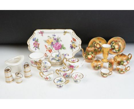 Two miniature tea sets to include a miniature Hammersley chintz tea service to include six tea cups and saucers, teapot, suga