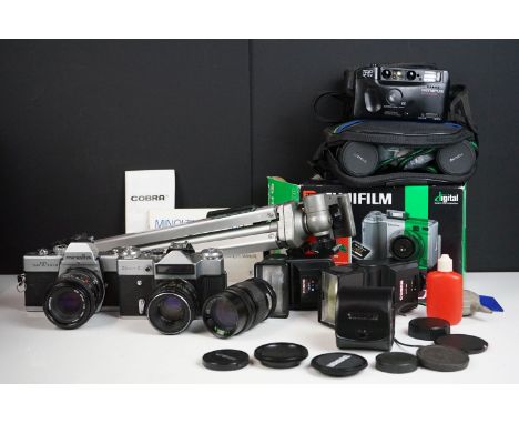 A small collection of mixed photographic equipment to include 35mm SLR cameras, lenses, tripod, flashguns...etc. 
