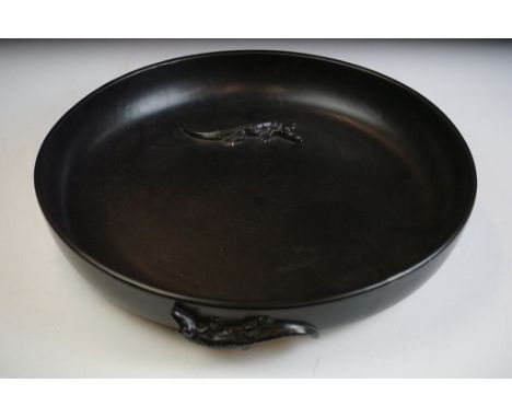 Large black ceramic centrepiece round dish having moulded raised crocodiles to the side and bowl. Measures 37cm diameter. 