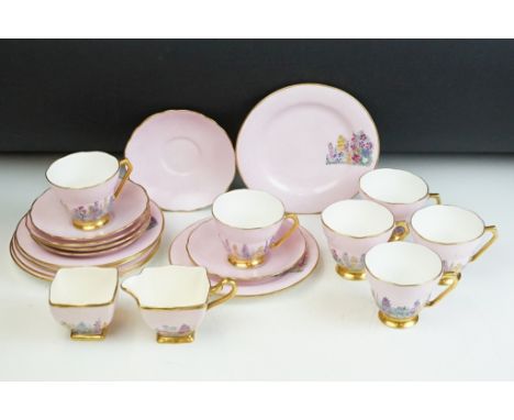 1930s Art Deco Royal Winton Grimwades pottery tea service. The service having a pink ground with floral detailing and gilt ri