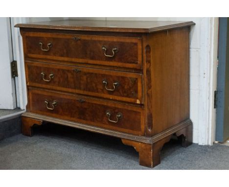 Burr Wood Chest of Three Long Drawers in the George III style raised on bracket feet, 97cm long x 45cm deep x 69cm high 