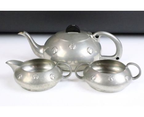 Civic Pewter Arts &amp; Crafts three-part tea set (pattern no. 3315) to include teapot, milk jug and sugar bowl, the pieces o