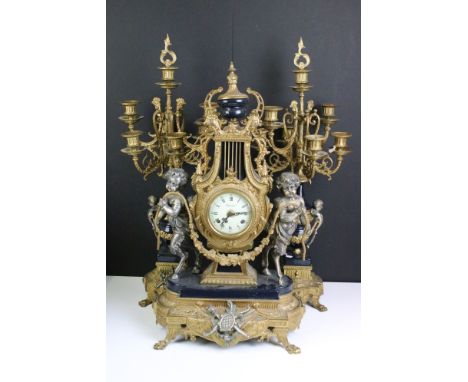 Italian 'Imperial' 20th century reproduction gilt metal &amp; blue enamel clock garniture set, in the Rococo style, the clock
