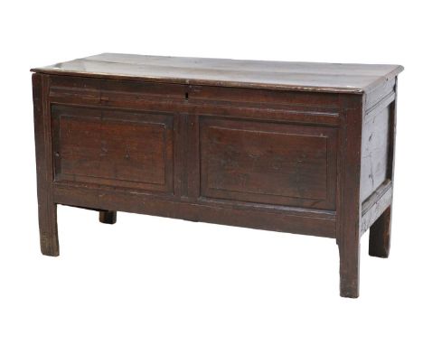 An Early 18th Century Joined Oak Chest, dated 1705 and initialled BI, the boarded hinged lid enclosing a later paper-lined in