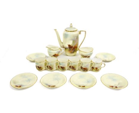 A Royal Worcester Porcelain Coffee Service, by Harry Stinton, 1933, painted with highland cattle in misty landscapes within g