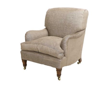 Attributed to Howard &amp; Sons: A Late 19th Century Bridgewater Type Upholstered Armchair, recovered in light brown linen, t