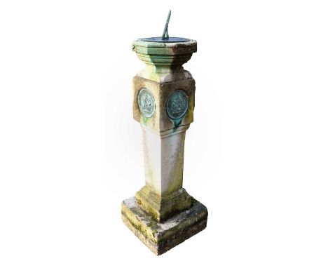 A Victorian Carved Stone and Metal-Mounted Garden Sundial, late 19th century, the gnomon and dial mounted on an octagonal-sha