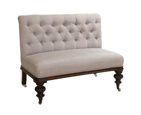 A Victorian Carved Mahogany Two-Seater Sofa, 3rd quarter 19th century, recovered in modern grey buttoned linen, with overstuf