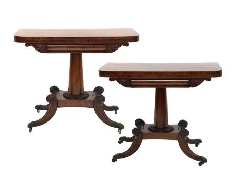 ~ A Pair of Mahogany Foldover Card Tables, circa 1810/20, of D shape form, the hinged leaf enclosing a baize lined interior w