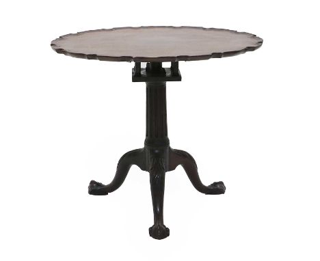 A George III-Style Carved Mahogany Tripod Table, part 18th century, the broad pie-crust moulded tilt-top above a bird-cage pl