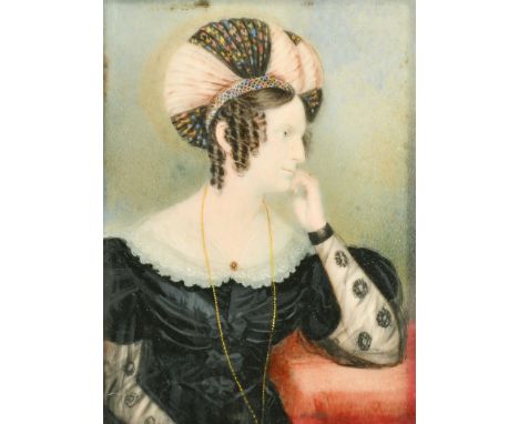 19th Century, a miniature portrait of a lady in an elaborate headdress, watercolour in ivory, 4" x 2.75" (10 x 7cm) in a red 