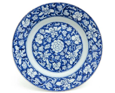 Floral decor, 18th Century, marked with double ring and Lozenge, 39 cm. in diameter, chip.