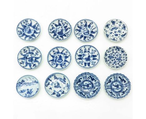 In diverse decors, including Kangxi Mark and Period, 11 cm. in diameter, chip and hairline.