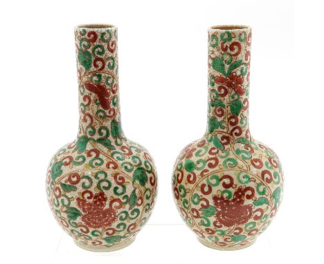 Crackle glaze ground with overall floral and vine decor, Kangxi mark, 25 cm. tall.
