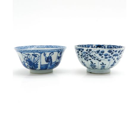 Floral decor, both marked with double ring, 15 cm. in diameter, chip.
