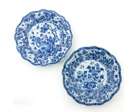 Scalloped edge with floral decor, marked with double ring, 18th Century, 12 cm. in diameter, fritting on edge.
