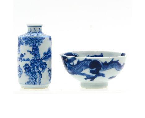 Bowl in blue and white dragon and cloud decor with small vase depicting monkeys, vase is 10 cm. tall, hairline in 1 cup.