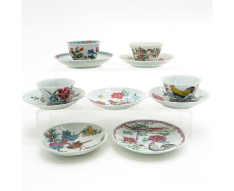 Including 4 cups and 7 saucers, in Famille Rose enamels including rooster decor, saucers are 11 cm. in diameter, in diverse c