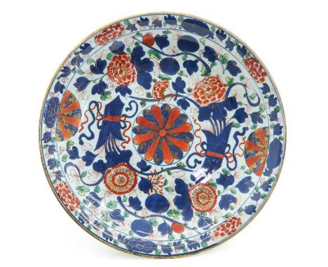Floral decor, marked with double ring and Lozenge, 36 cm. in diameter, fritting.
