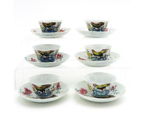 Decorated with roosters and florals, 18th Century, saucers are 11 cm. in diameter, chip and hairline.