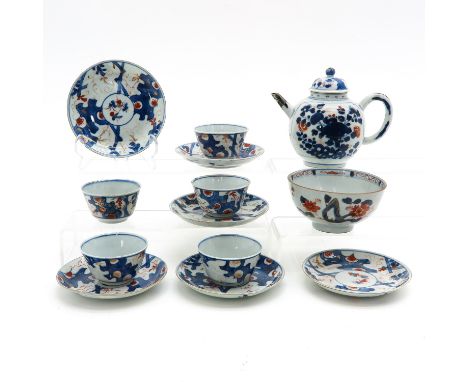 including teapot and cups and saucers with small bowl, bowl is 12 cm. in diameter, some with chip and hairline.