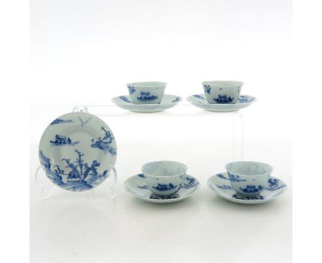 Including 4 cups and 5 saucers, saucers are 10 cm. in diameter, blue and white river scene, 18th Century, chip.