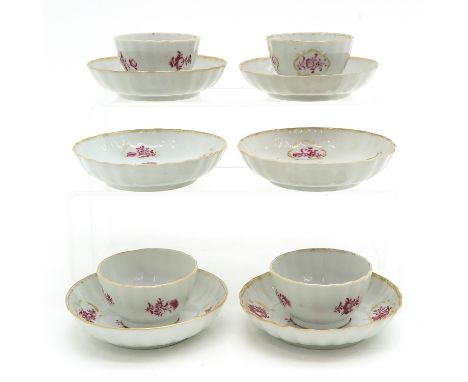 Including 4 cups and 6 saucers, 18th Century, in pink floral decor, 12 cm. in diameter, hairline in glaze.