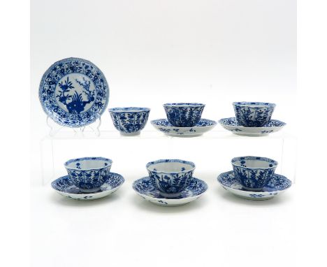 Kangxi Mark and Period, saucers are 14 cm. in diameter, with chip and hairline.
