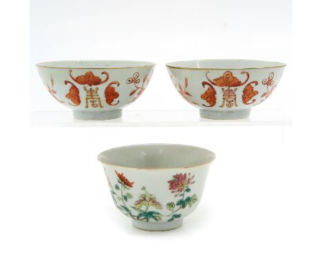 Including iron red decor of bats and Chinese symbols marked Guangxu, 11 cm. in diameter. Large cup hairline.