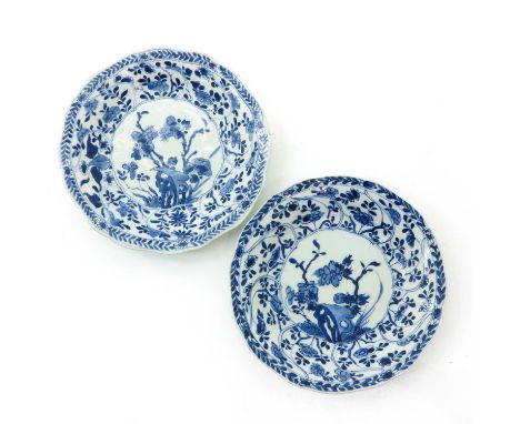 Floral decor, marked with double ring and artemisia leaf, 21 cm. in diameter, chip.