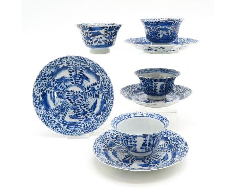 Including 4 cups and saucers, blue and white landscape decor, saucers are 15 cm. in diameter, including Kangxi Mark and Perio