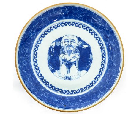 Depicting Chinese unusual scene of man in center of plate, 19th Century, marked with double ring, 29 cm. in diameter.