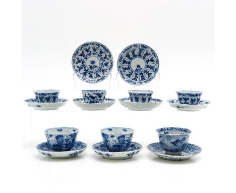 including 7 cups and 9 saucers, 12 cm. in diameter, including Kangxi Mark and Period, chip and hairline.
