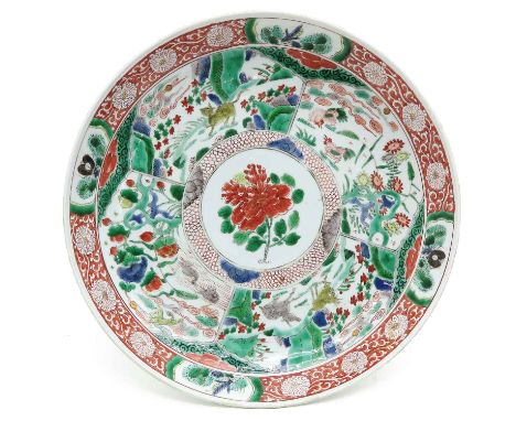 18th Century, marked with double ring, 27 cm. in diameter, chip.