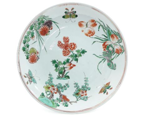 Floral decor, marked with double ring and artimisia leaf, 34 cm. in diameter, with chip and hairline.