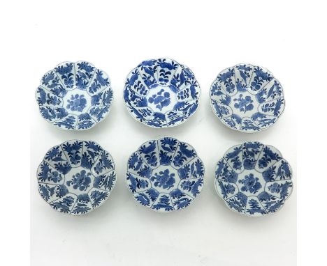 Scalloped edge with floral and bird decor, marked with ring on bottom, 16 cm. in diameter.
