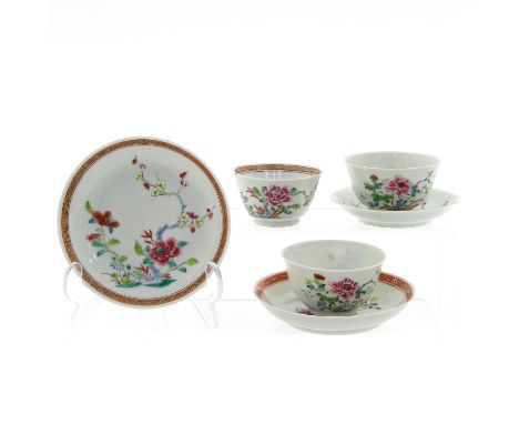 Including 3 cups and 2 saucers in Famille Rose decor, 11 cm. in diameter, chip and hairline.