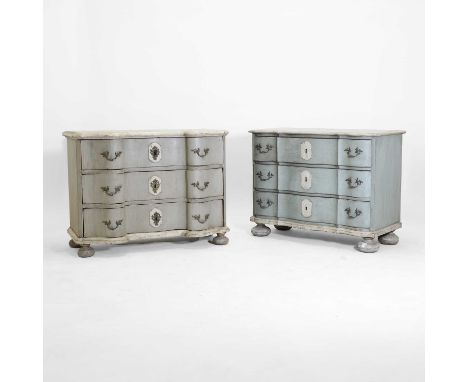 A near pair of painted commode chests, early 19th century, Italian, each with a simulated marble top over a serpentine front,